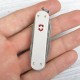 Ніж Victorinox Minichamp Alox 58мм,15функ,ріфл.срібл